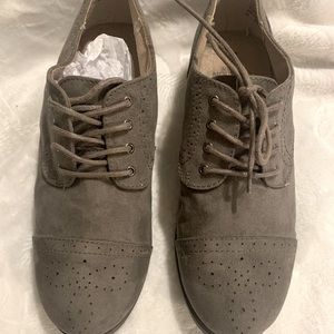 Grey suede wingtip tie dress shoe